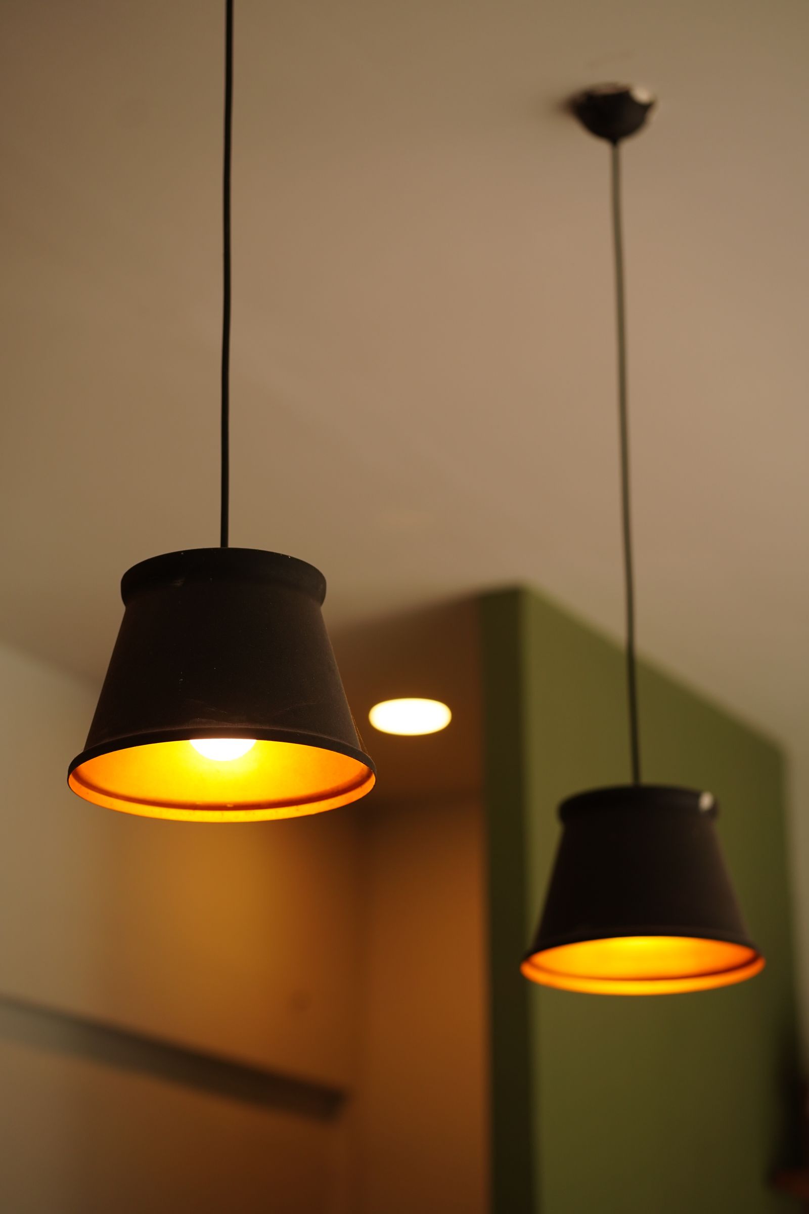 Warm pendant lighting glowing in a stylish modern home